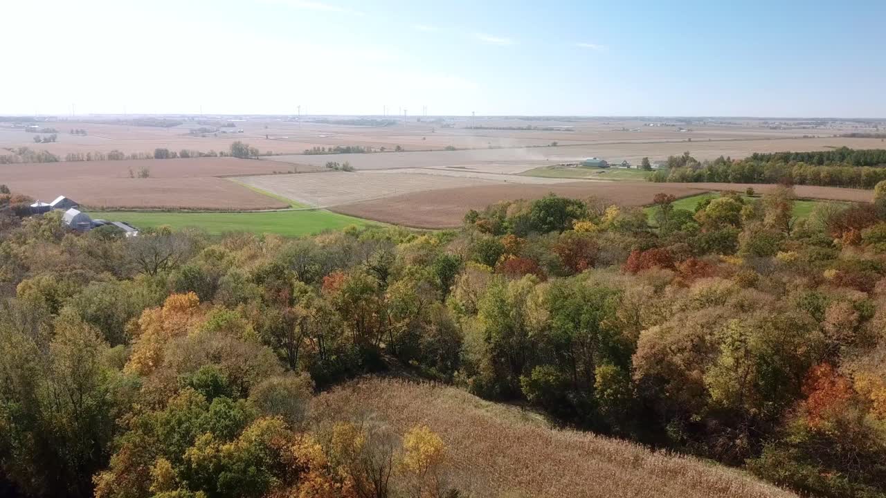 Aerial drone view of timber and ready to be harvested fields in autumn in the Midwest, USA