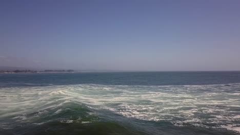 surfer-in-the-deep-blue-ocean-on-surfboards