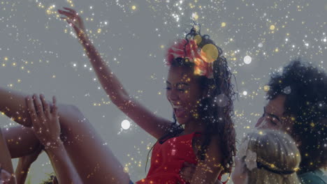 friends lifting woman during event marketing shoot, showing floating light particles