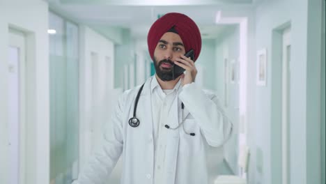 angry sikh indian doctor shouting on call
