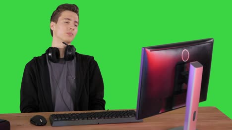 upset gamer expressing disappointment watching online game on a green screen, chroma key