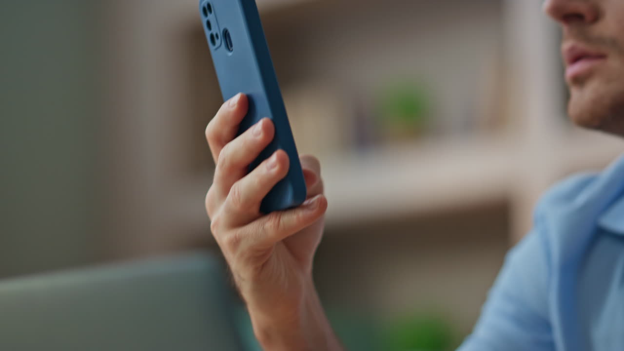 Entrepreneur browsing smartphone application in office closeup. Focused man