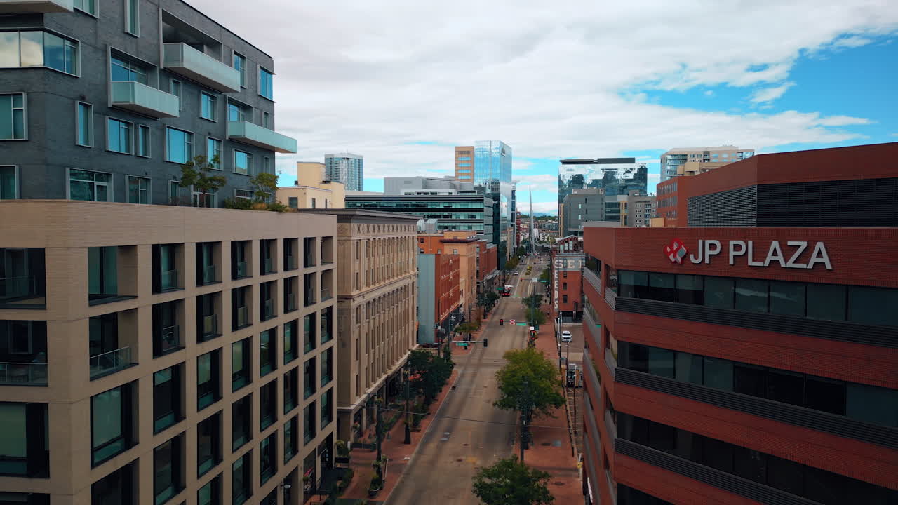 Denver, USA, 24 August 2025: Rising over the street in Denver, Colorado, USA. View on the cityscape from the drone at daytime