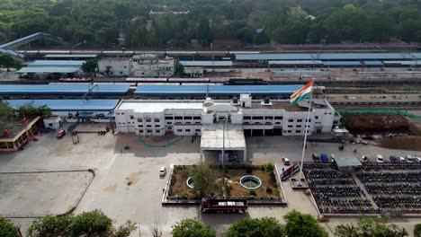 aerial drone shot of villupuram in railway station with indian flag