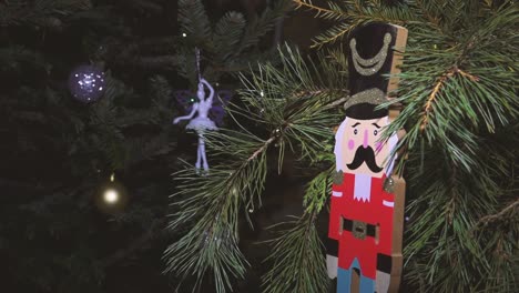 nutcrackers hanging on christmas tree