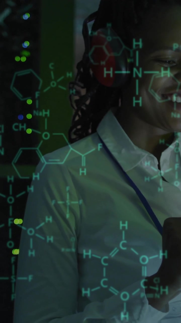 Animation of scientific data processing over african american female it technician by servers