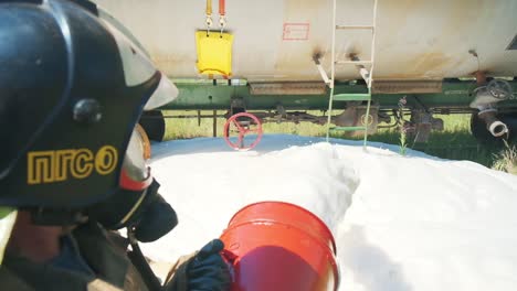 firefighter responding to a train tanker spill