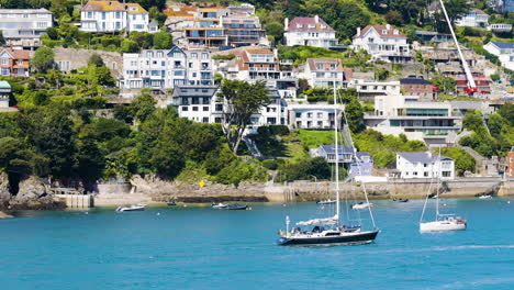Coastal Town Harbor Scene with Sailboats