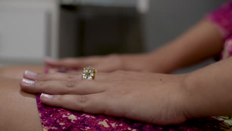 Detail-of-the-painted-nails-of-a-woman-that-is-getting-ready-for-a-party-at-beauty-salon