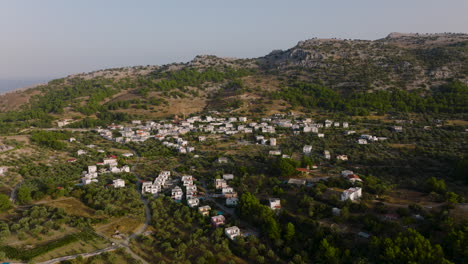 quaint pilonas village amongst olive groves in pilonas, greece