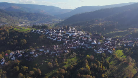 Aerial view of the village of Bermersbach, Forbach, in autumn in the Murgtal region of the Black Forest, highway and bridge in the background