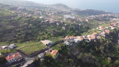 sea views looking over houses and fields in ponta do sol in madeira
