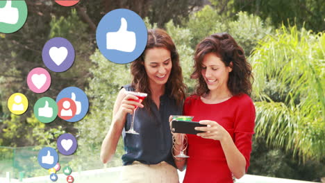 two ladies taking selfies while drinking cocktails 4k