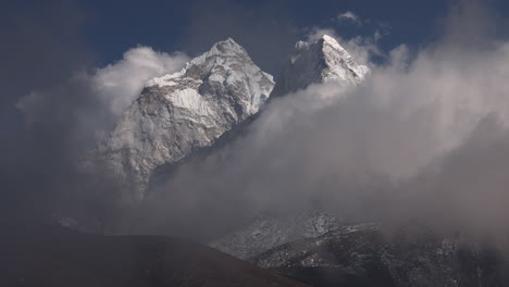 slow motion clouds over the mountain peaks in nepal, himalayas