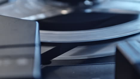 tape recorder play head, extreme closeup of playing magnetic tape