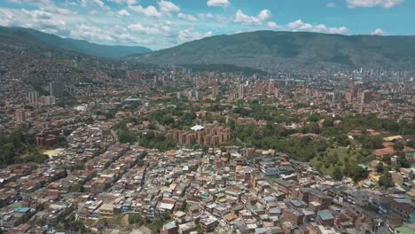 drone aerial view from comuna 13 slums and medellin city in colombia