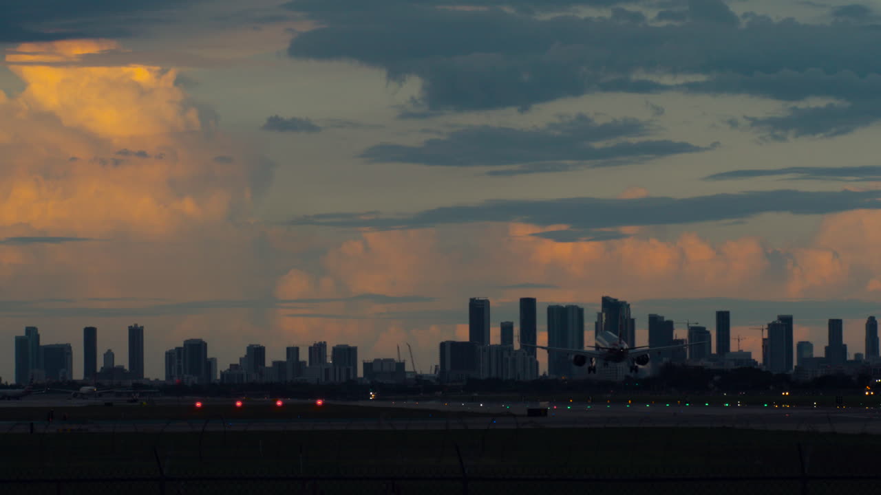 Airplane Landing in Miami at Sunset