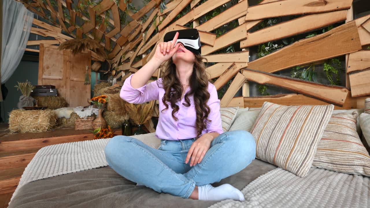 Woman enjoying looking through VR headset