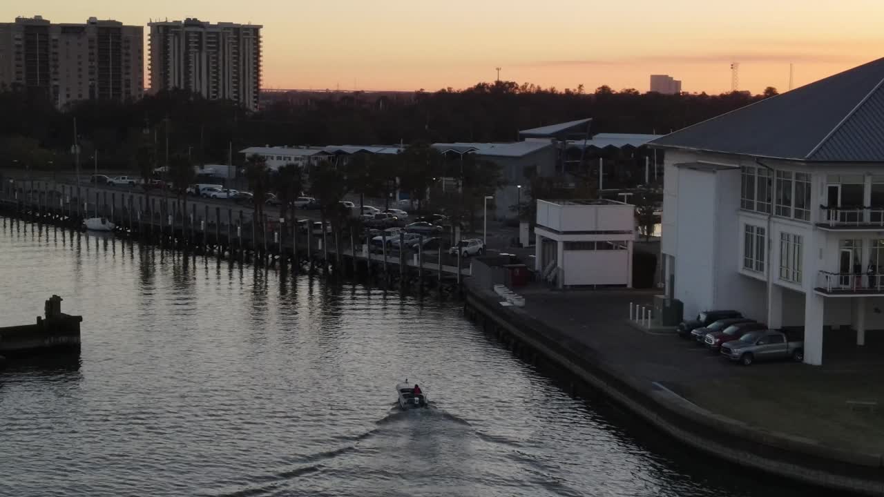 Power Boat Passing By The Pontchartrain Lakeshore In Southern Yacht Club, New Orleans, Louisiana USA. Aerial
