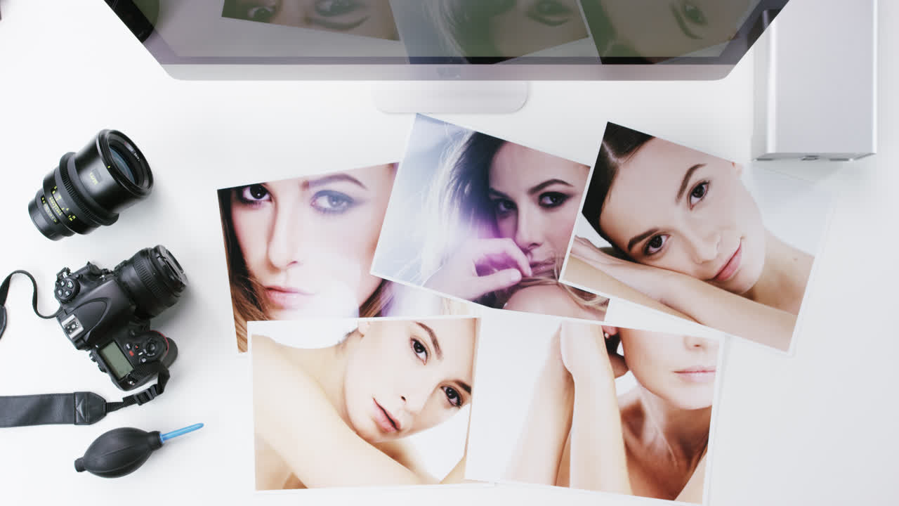 Top view photographer graphic designer chosing beauty images working at desk from above - Red Epic Dragon