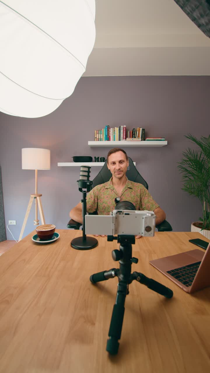 Man Recording a Video at Home