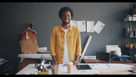 fashion designer in his studio