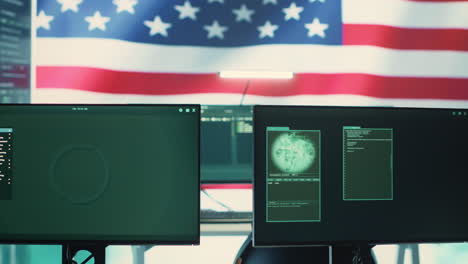 Empty-cybersecurity-operations-center-featuring-an-American-flag