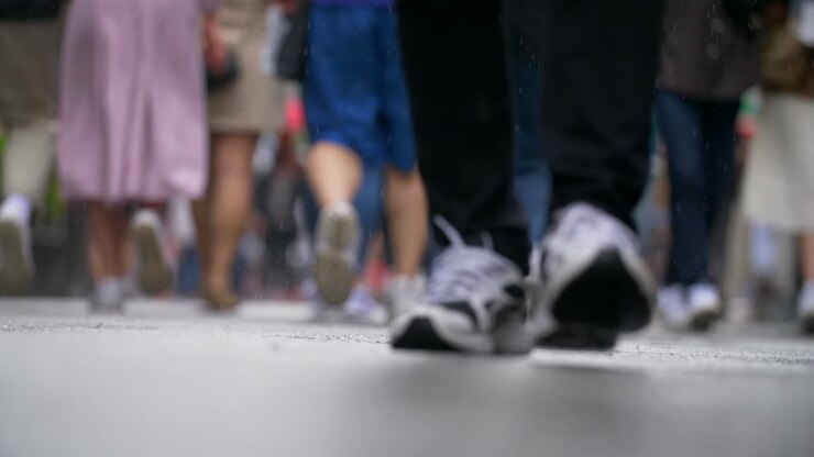 Low Level Shot of People in Rain
