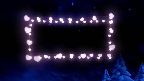 Pink-glowing-decorative-heart-shaped-fairy-lights-against-shining-blue-stars-in-night-sky