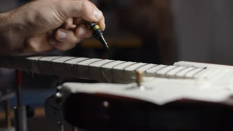 guitar neck repair and fretboard marking