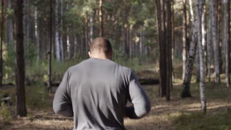 man running in the forest