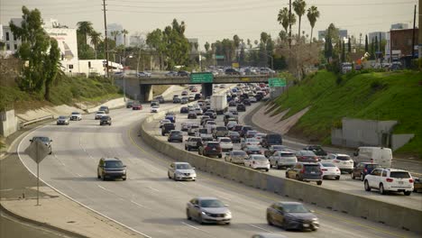 los angeles traffic moving both ways, mid day in hollywood