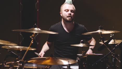 drummer performing in a studio setting