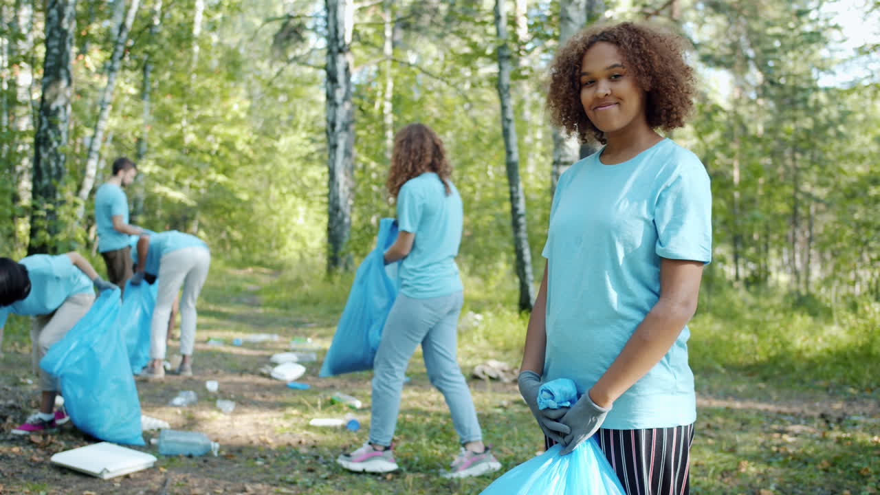 Community Volunteers Cleaning Up a Forest