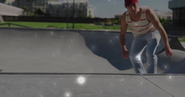 Skater in uno skate park di cemento