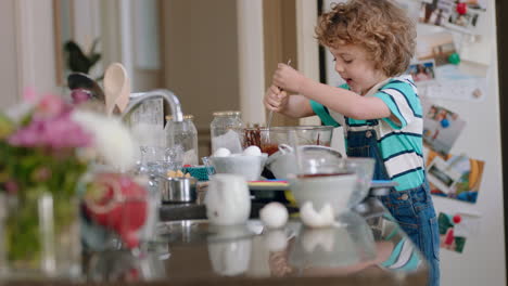 happy-little-boy-baking-in-kitchen-mixing-ingredients-for-homemade-chocolate-cupcakes-having-fun-preparing-delicious-treats