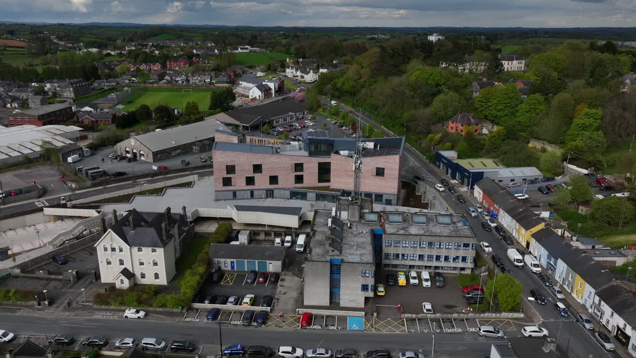 Aerial View of a Modern Brick Building in a Town