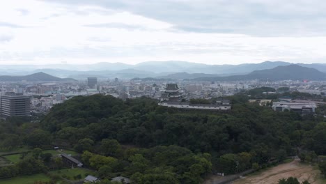 aerial view of wakayama castle and city on the horizon, kansai japan