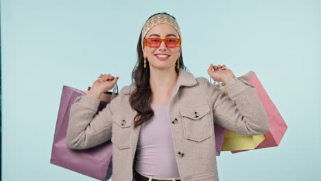 Shopping-bag,-portrait-and-studio-woman-excited