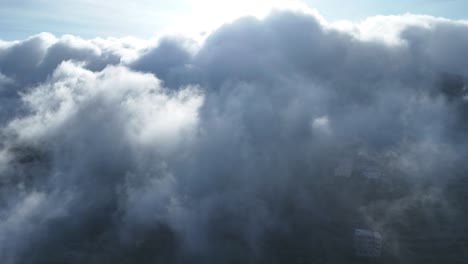 aerial flying towards and passing through cloud, abha, saudi arabia