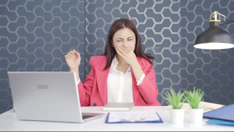 Young-business-woman-smelling-sweat-expressing-negative-at-camera.