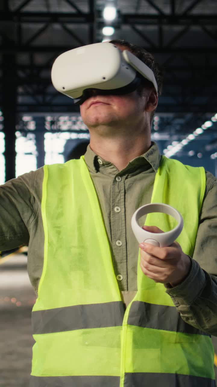 Vertical Video Employee uses VR headset to test 3D simulation concepts for heavy machinery