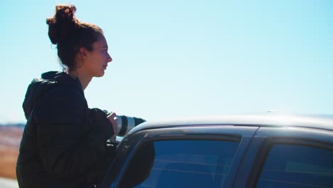 Woman-Photographer-Capturing-Images-in-Truck,-Ranch-Photographer