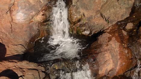 close-up of hidden falls regional park waterfall and creek flowing through the auburn, california mountains