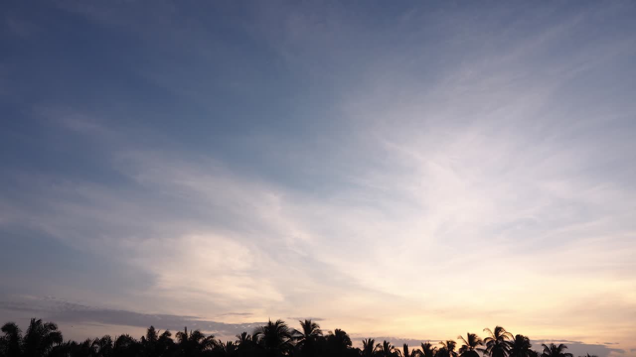 colorful wispy cirrostratus clouds in evening skycape in a beautiful warm evening. timelapse abstract color of the light before sunset clear sky day nature landscape background screen.