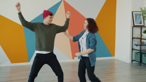 energetic couple dancing
