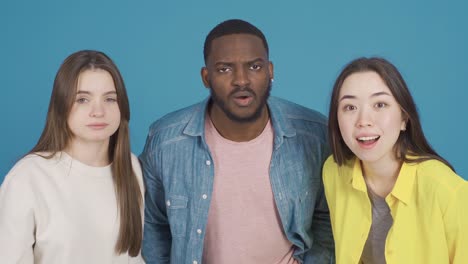 Multiethnic people, black, Asian and European youth are stunned, surprised and fascinated.