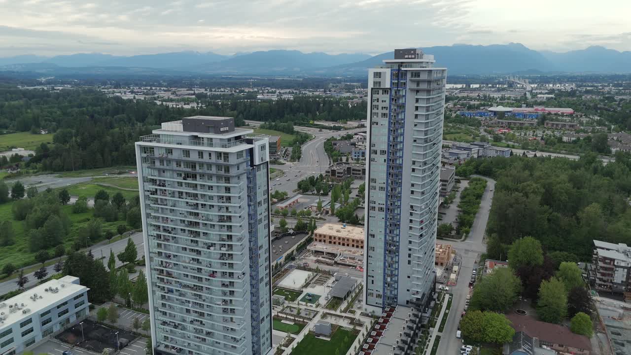 Two Tower Building Of Condominiums In Langley Township, BC, Canada. - aerial shot