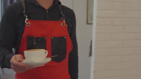 waiter serving coffee