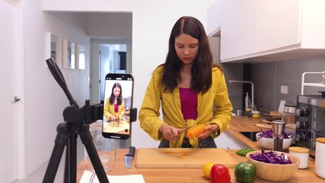 woman cooking a carrot recipe tutorial